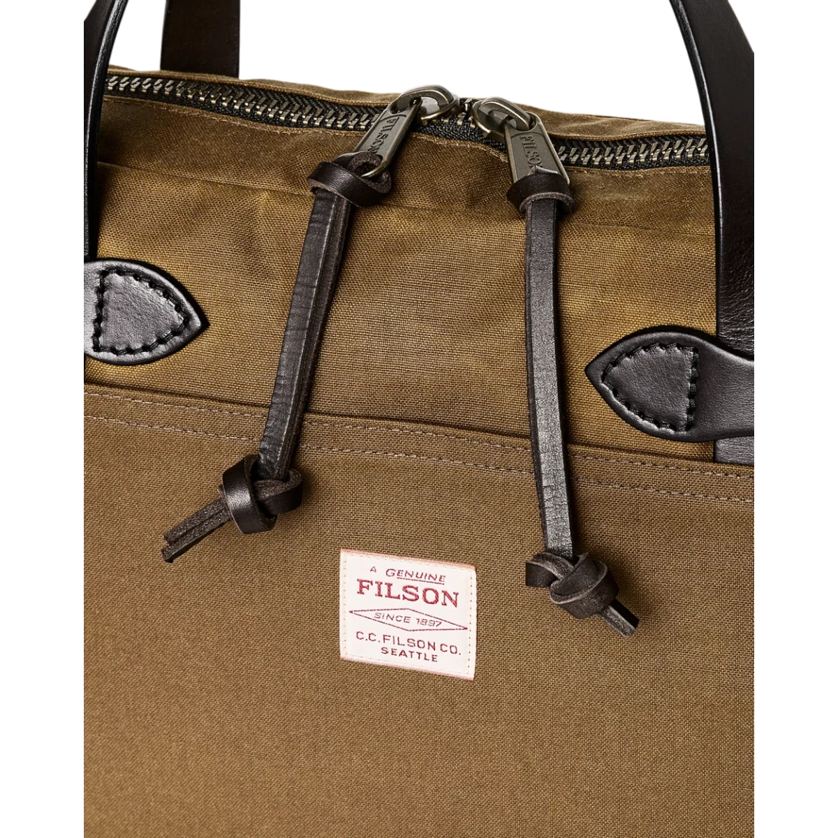 MILWORKS Filson Tin Cloth compact briefcase in dark tan featuring leather zipper pulls and a branded woven label