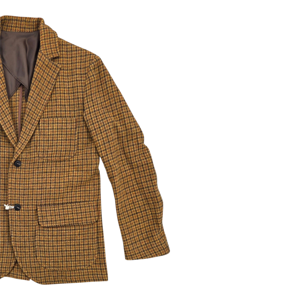 MILWORKS East Harbour Surplus Freeport jacket in a beige and brown pied de poule pattern with front flap pockets.