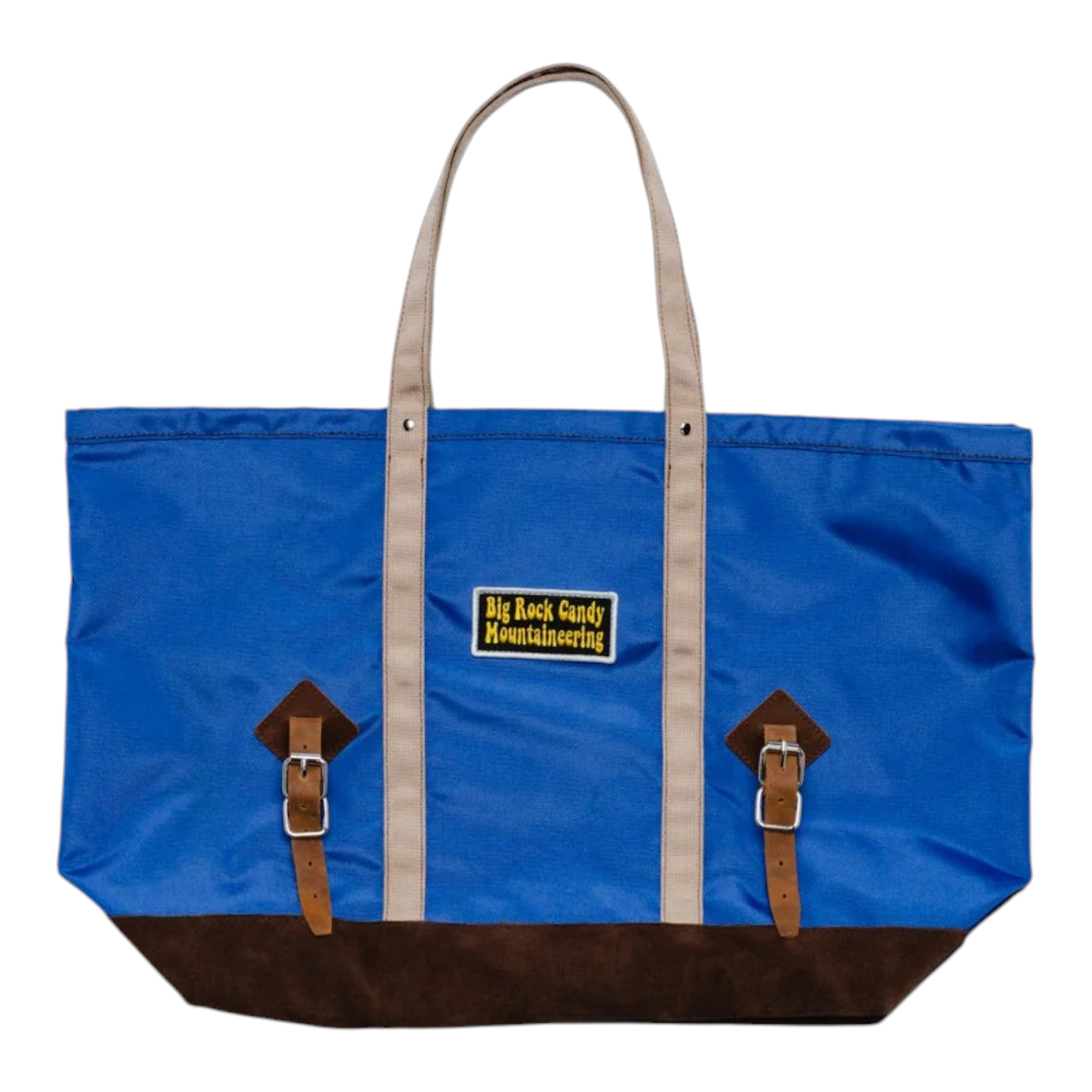 MILWORKS Gator Tote in blueberry blue canvas with a brown suede base, leather straps, and vintage-style patch.