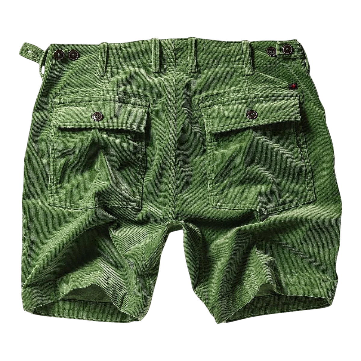 MILWORKs green corduroy shorts with 7.5" inseam, featuring button-flap back pockets and adjustable waist tabs.