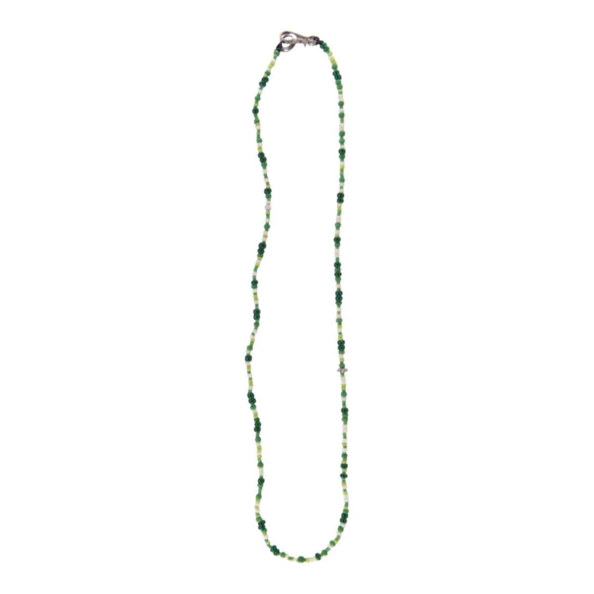 MILWORKS hand-crafted beaded necklace featuring various shades of green and white beads on a delicate string.