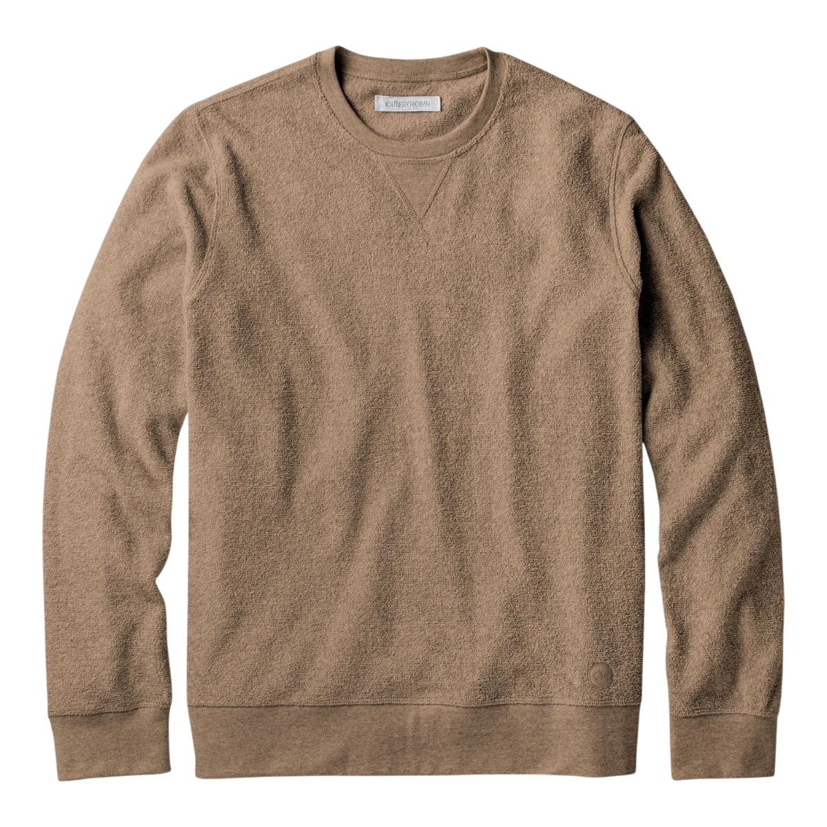 MILWORKS Hightide Crew sweatshirt in heather coconut brown. Features a textured knit, crew neck, and V-stitch detail at the collar.