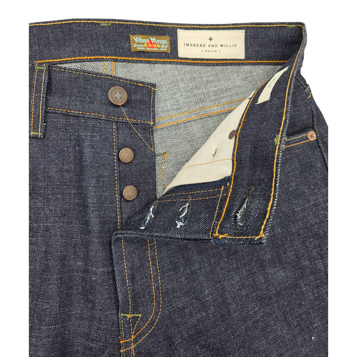 MILWORKS Imogene and Willie indigo rigid selvage denim jeans featuring a button fly and Nihon Menpu label detail.
