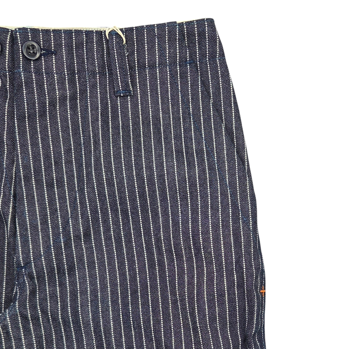 MILWORKS indigo carpenter pants featuring a white vertical stripe pattern, high rise, and durable triple-needle seams.