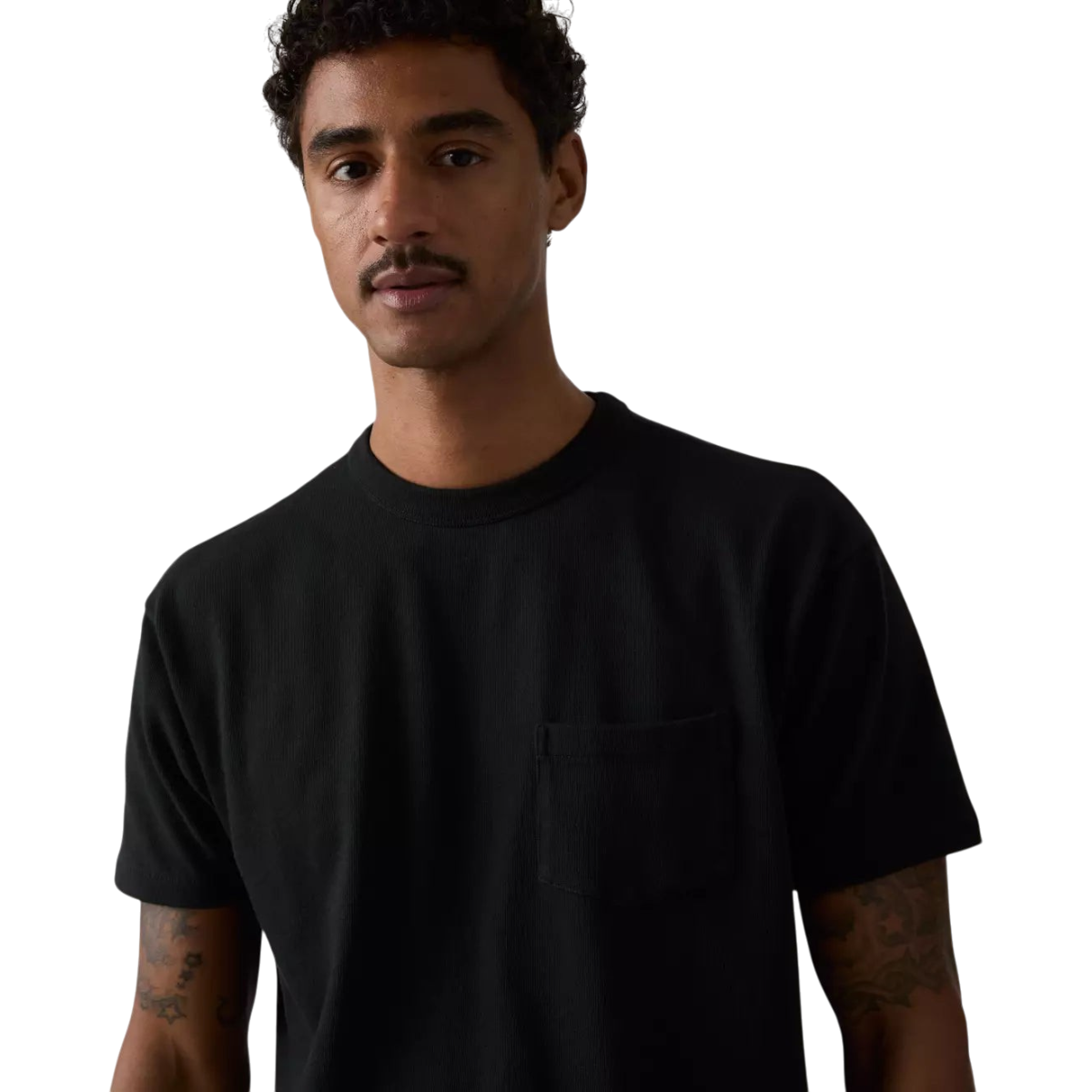 MILWORKS model wearing a jet black heavyweight cotton crew neck t-shirt with a chest pocket from the 1960s archive.