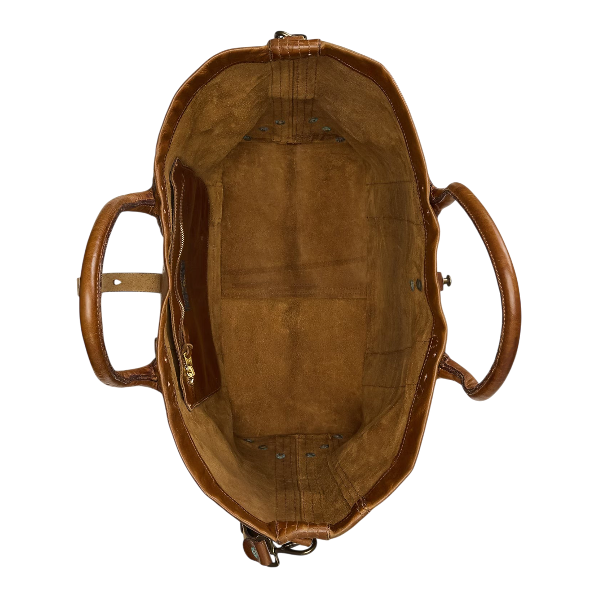 MILWORKS saddle brown leather tote bag interior view showing unlined sueded finish, slip pocket, and brass hardware.