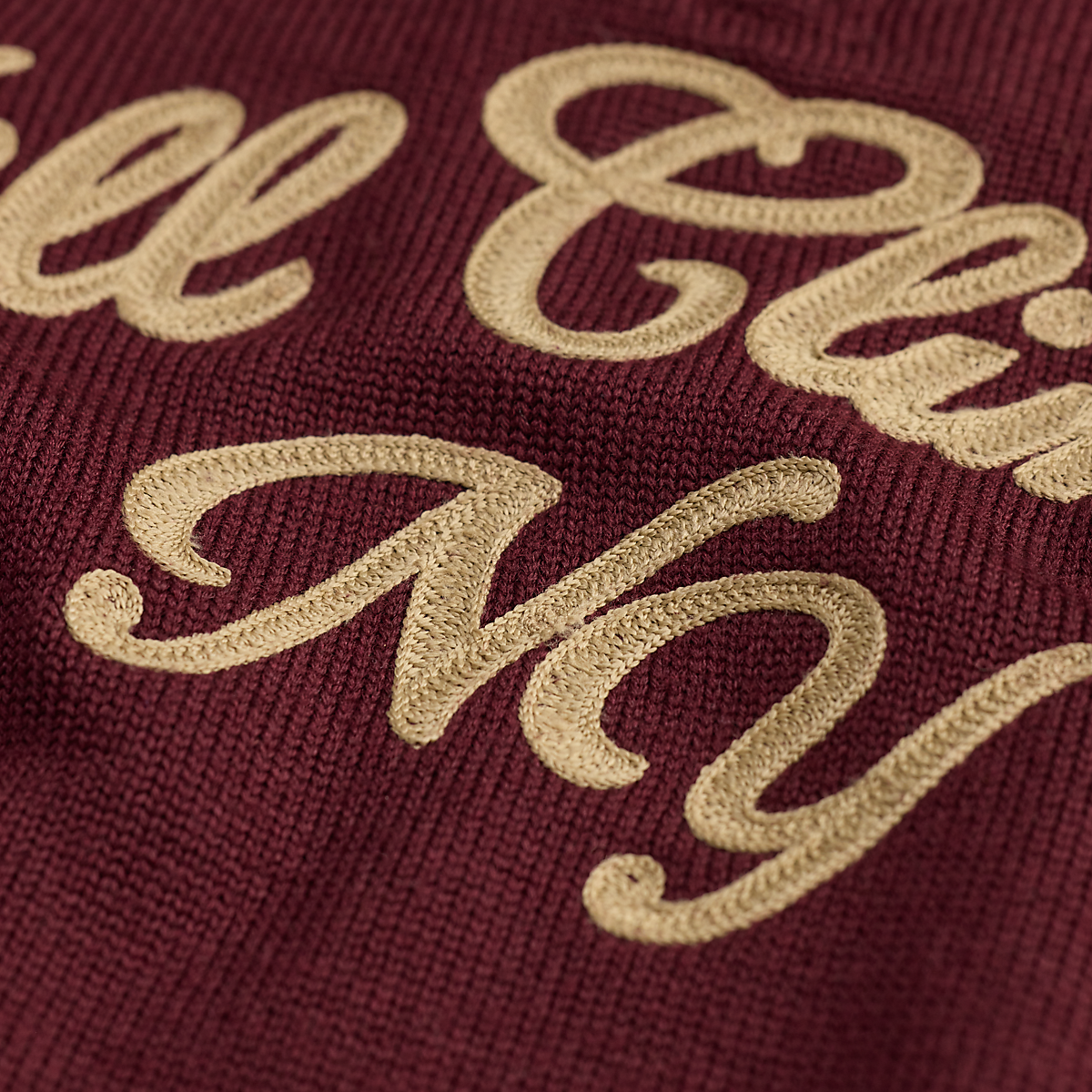 MILWORKS maroon wool sweater featuring detailed Hill Climbers NY script embroidery in gold thread