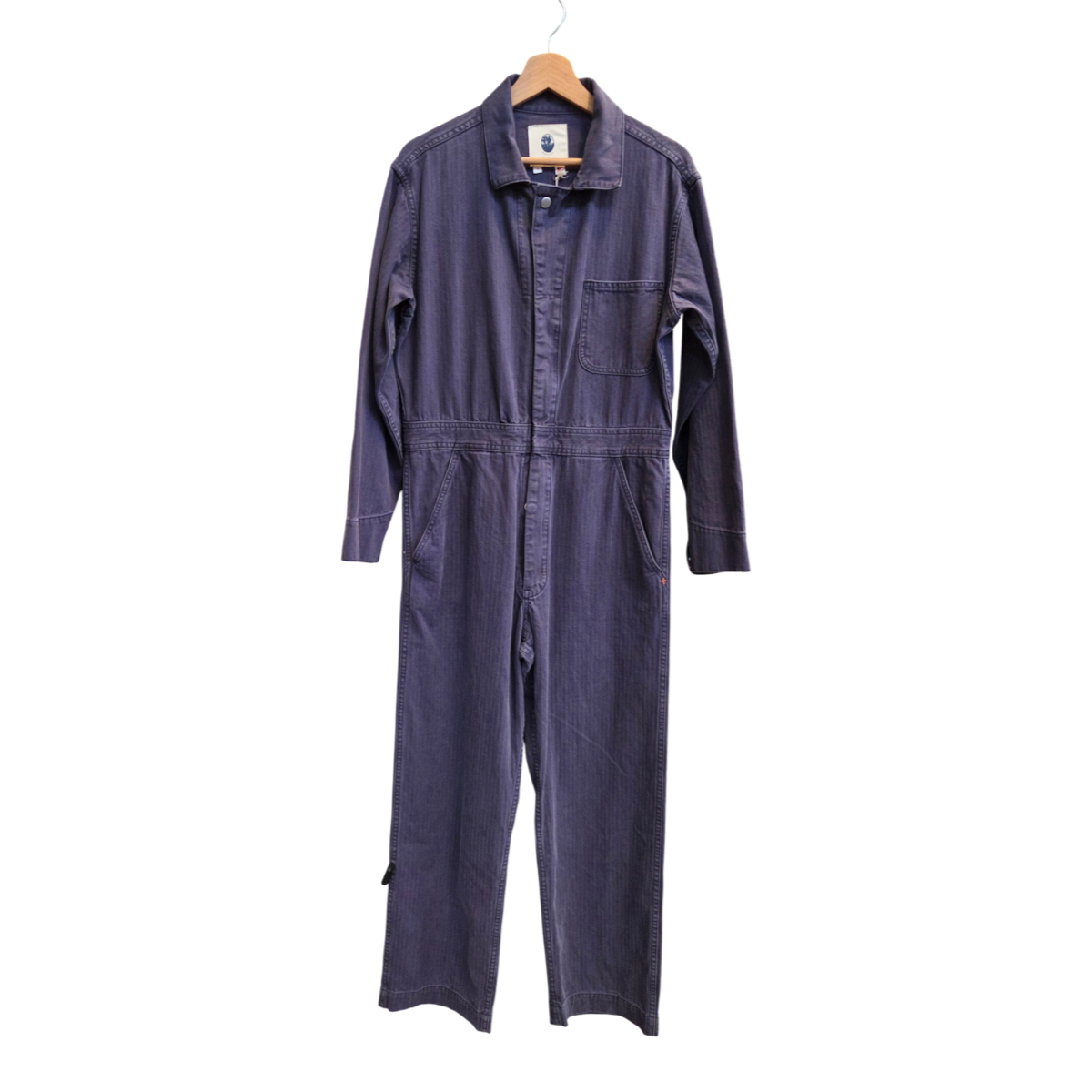 MILWORKS mechanic coverall in deep-blue stone-washed Japanese herringbone twill with a zip front and straight leg.