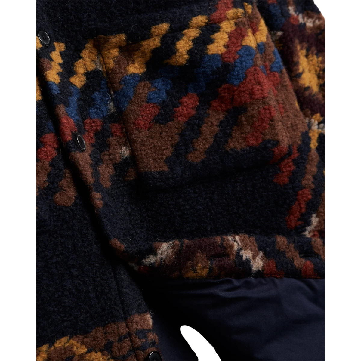 MILWORKS Mia wool blend overshirt featuring a textured navy, brown, and blue geometric pattern and mother of pearl buttons