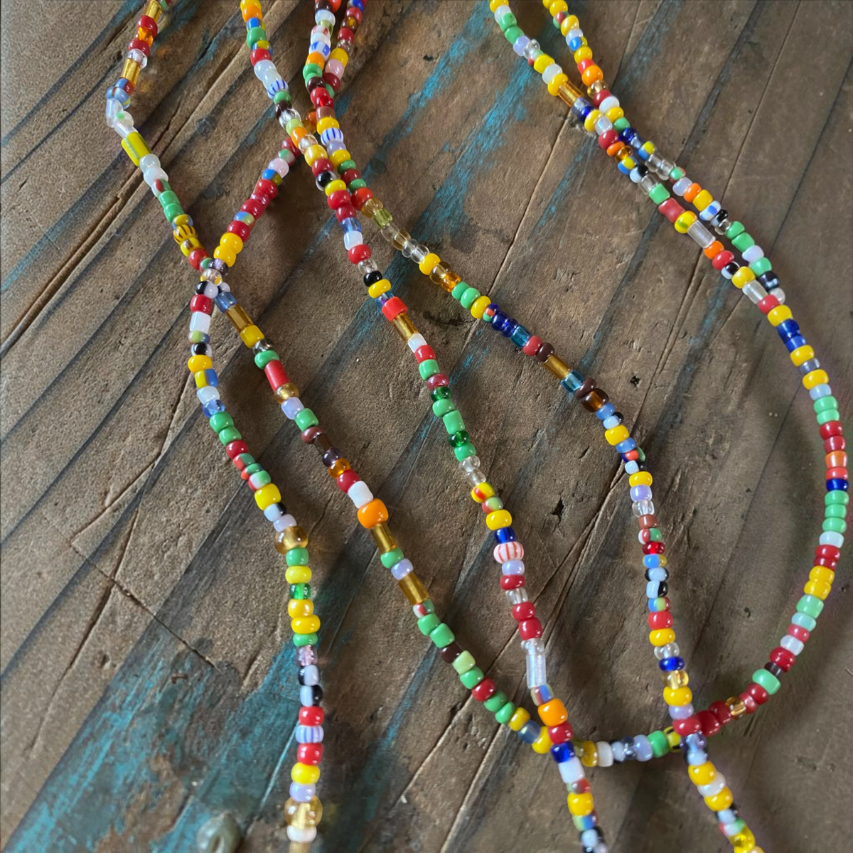 MILWORKS multicolored mini glass trade beads on cotton thread, 30-inch length for layering