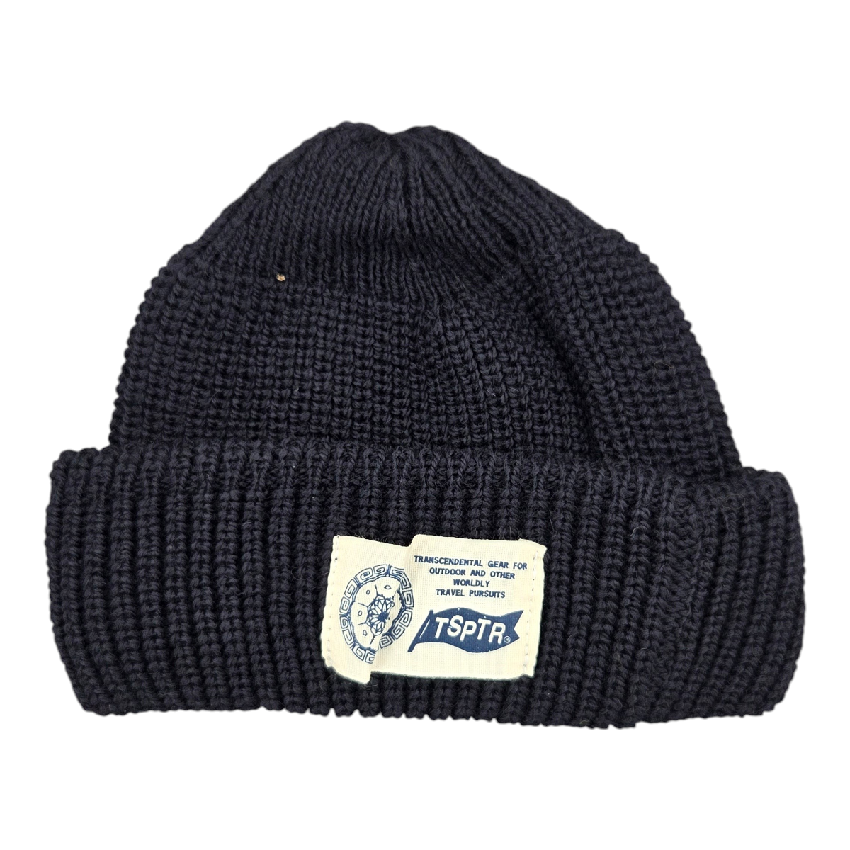 MILWORKS Cosmic Rambler navy blue 100% Merino wool knit hat with a chunky folded cuff and TSPTR woven cactus label.