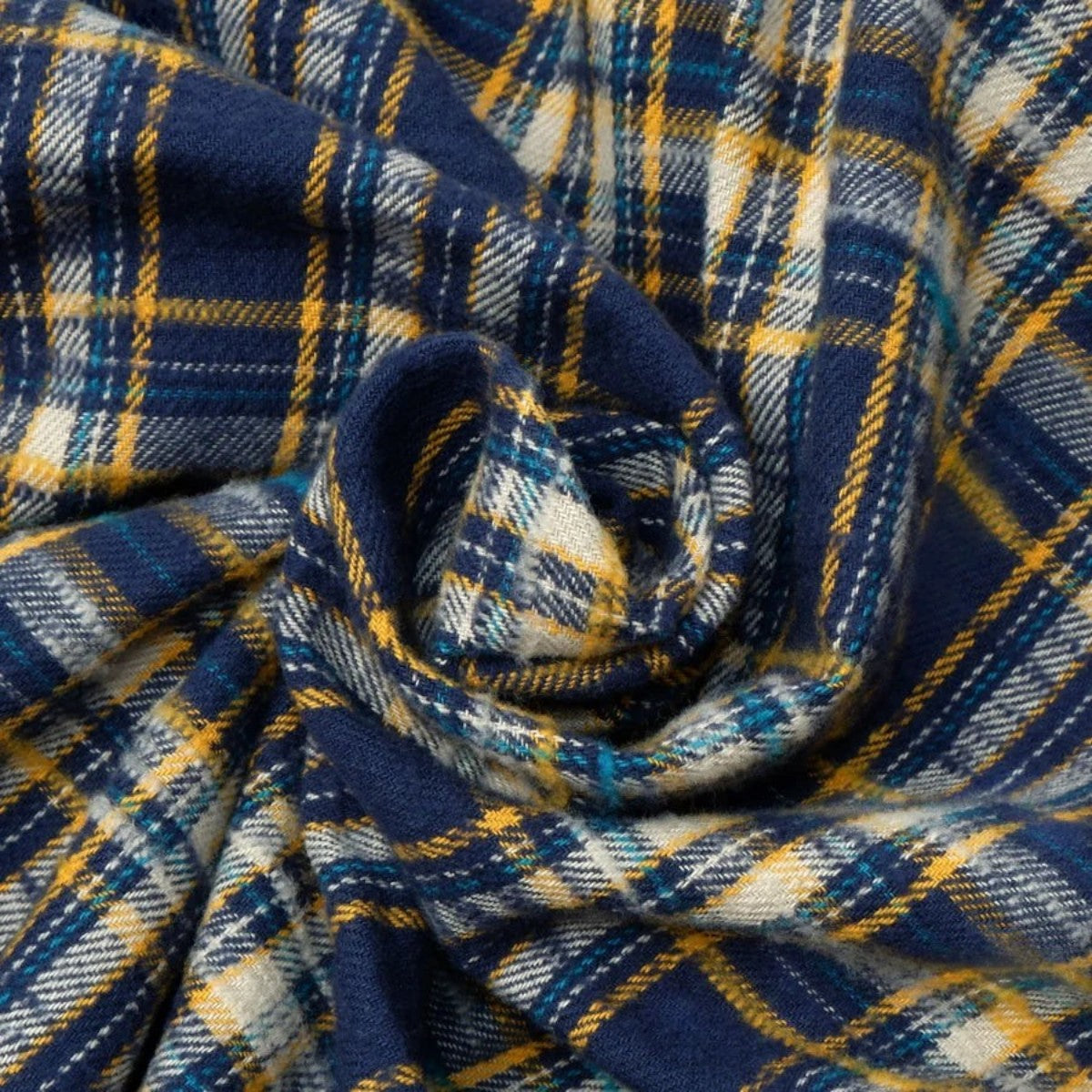 MILWORKS navy slub heavy flannel fabric with a textured brushed finish and a small yellow and white check pattern