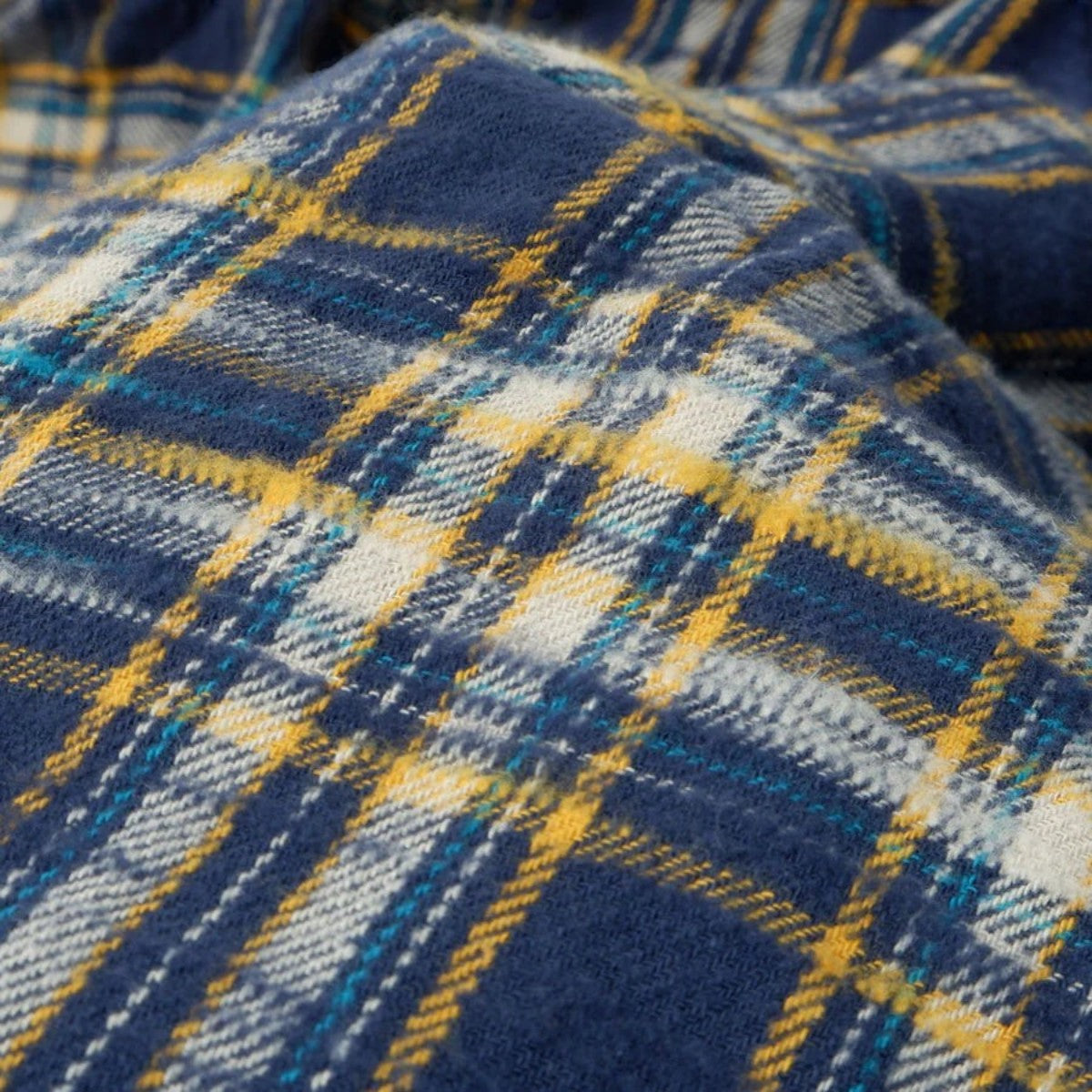 MILWORKS navy slub heavy flannel shirt with a textured brushed finish and a small muted check pattern