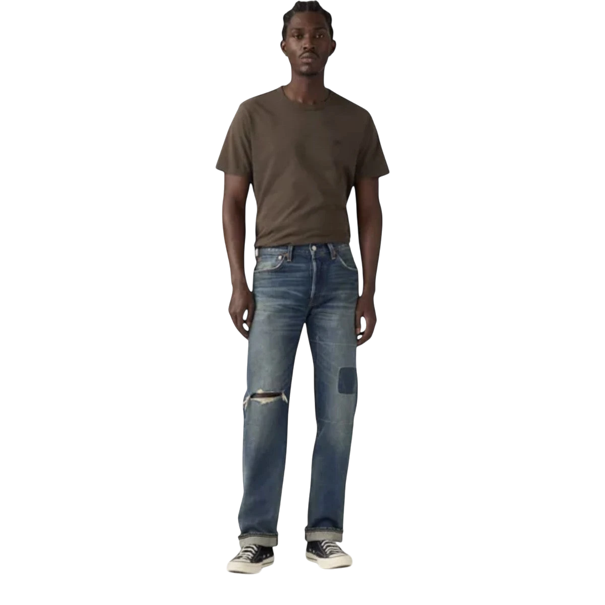 A model wearing MILWORKS 501 Original Nevada Farmers Selvedge jeans with a distressed blue wash and straight leg fit.