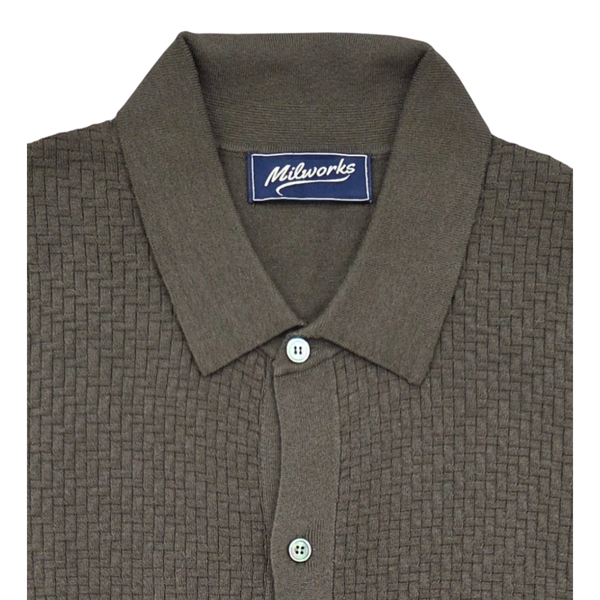 MILWORKS olive green short sleeve knit polo shirt with a textured weave and button placket. Made from cotton and cashmere blend.