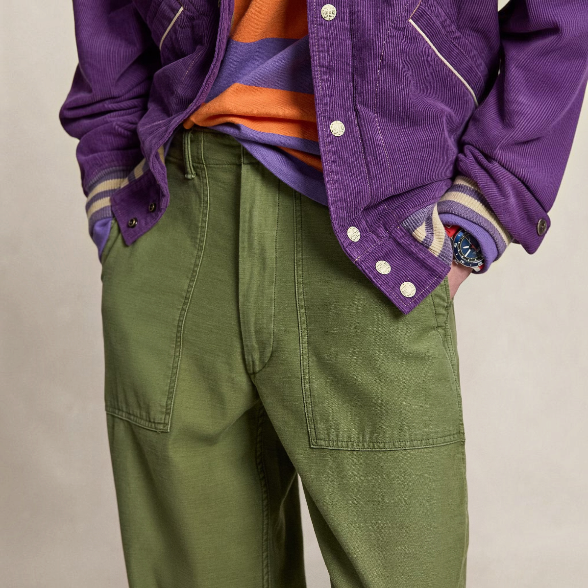 MILWORKS olive green relaxed fit utility pants in reverse-sateen cotton with front angled pockets.