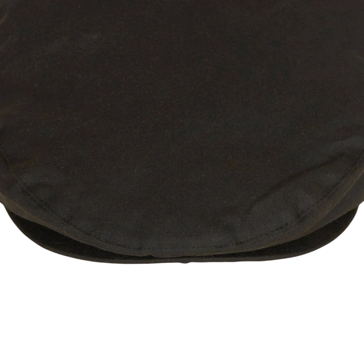 MILWORKS olive waxed cotton flat cap with a pre-formed peak and traditional British heritage styling.