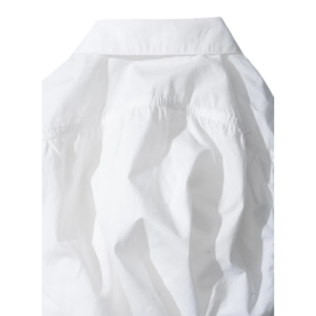 MILWORKS Ordinary Fits white cotton work shirt featuring a classic collar and boxy silhouette detail.