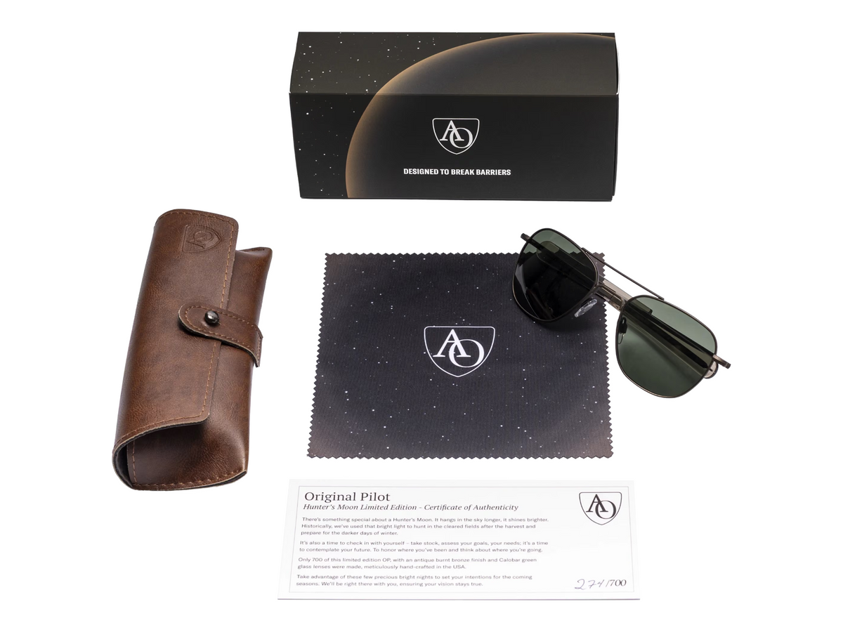 MILWORKS Limited Edition Original Pilot Hunter Moon sunglasses with burnt bronze frames, green lenses, case, and box.