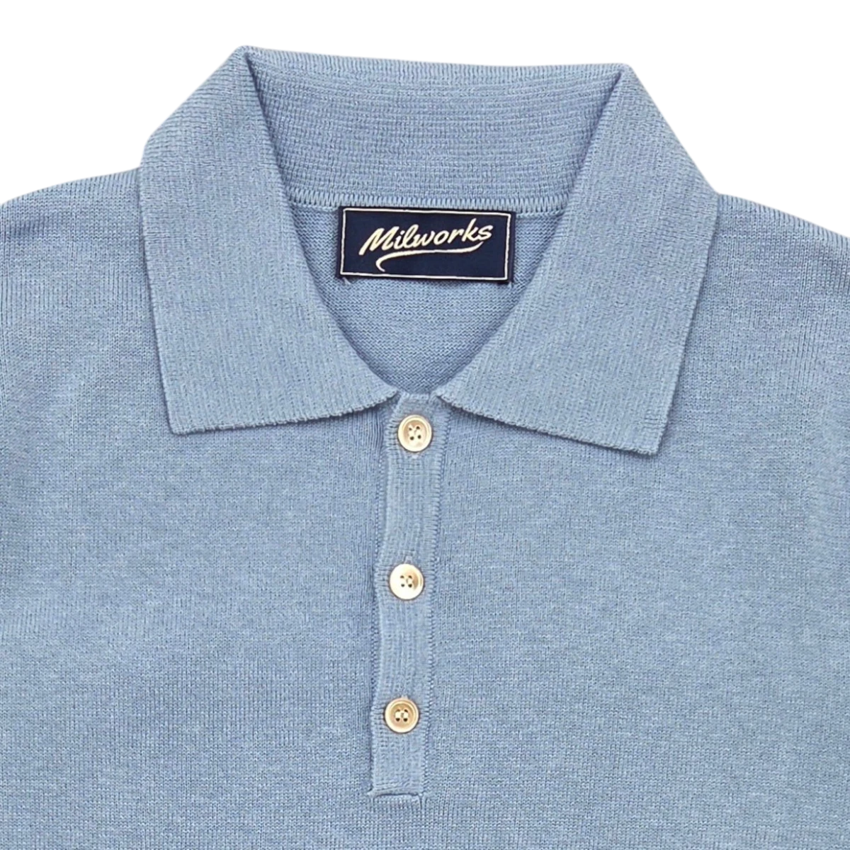 MILWORKS pale blue short sleeve knit polo shirt made from 95% cotton and 5% cashmere, featuring a classic collar and three button placket.