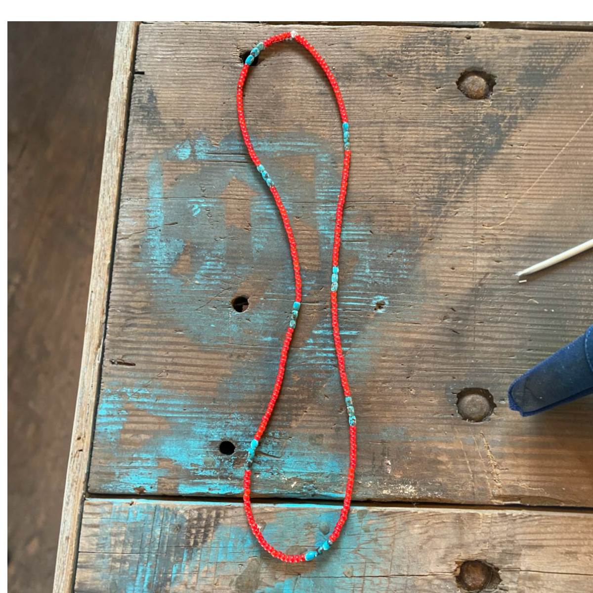 MILWORKS red and turquoise bead necklace featuring vintage glass white-heart beads and genuine turquoise on steel cord