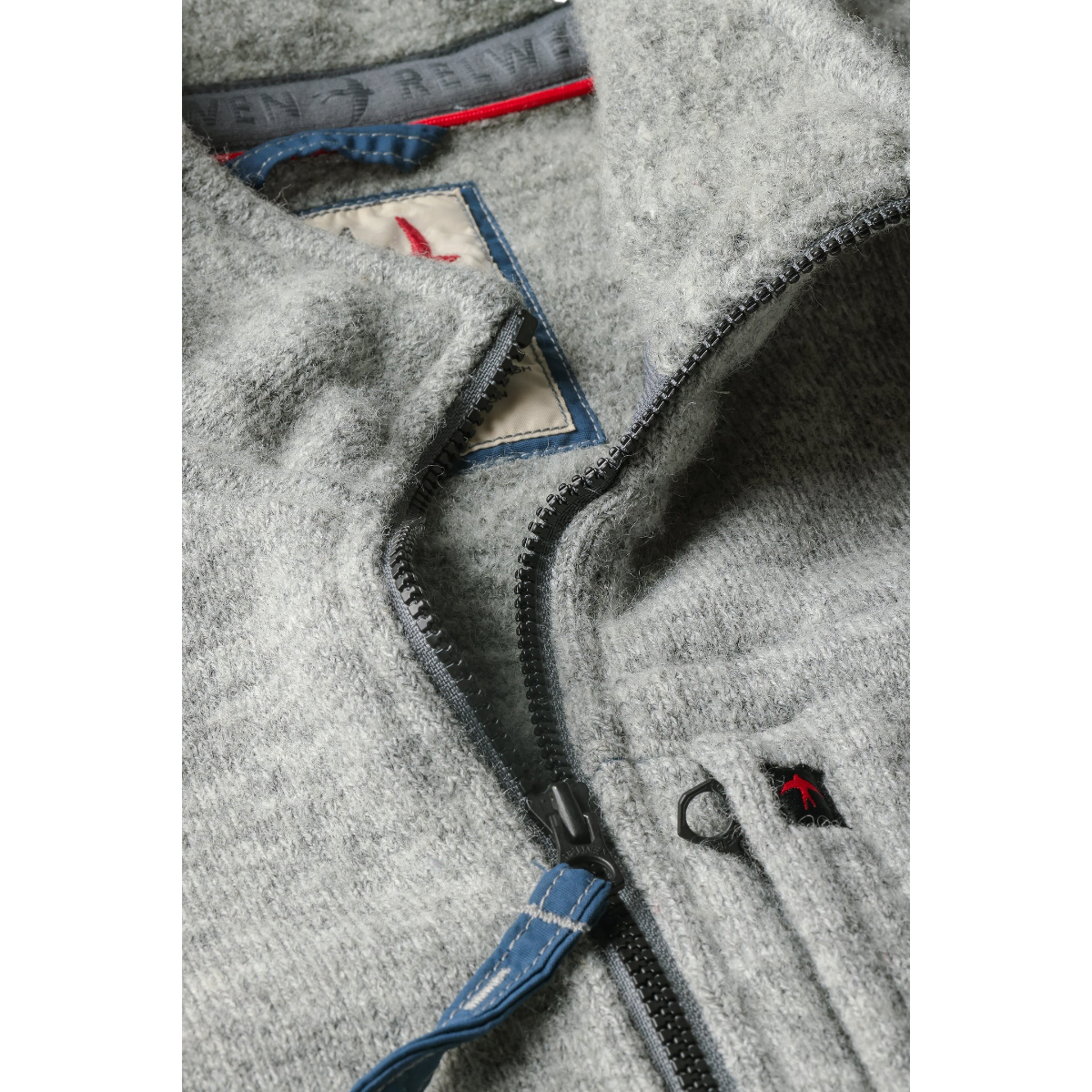 Relwen Basecamp track jacket in light grey heather wool terry with a mock collar and two-way front zipper detail.