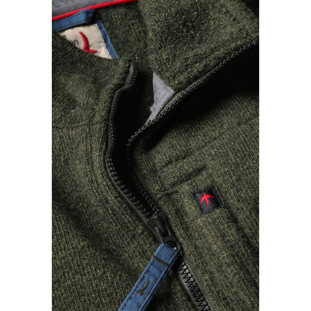 Milworks Relwen Basecamp track jacket in black forest heather wool terry with a two-way zipper and chest pocket detail.