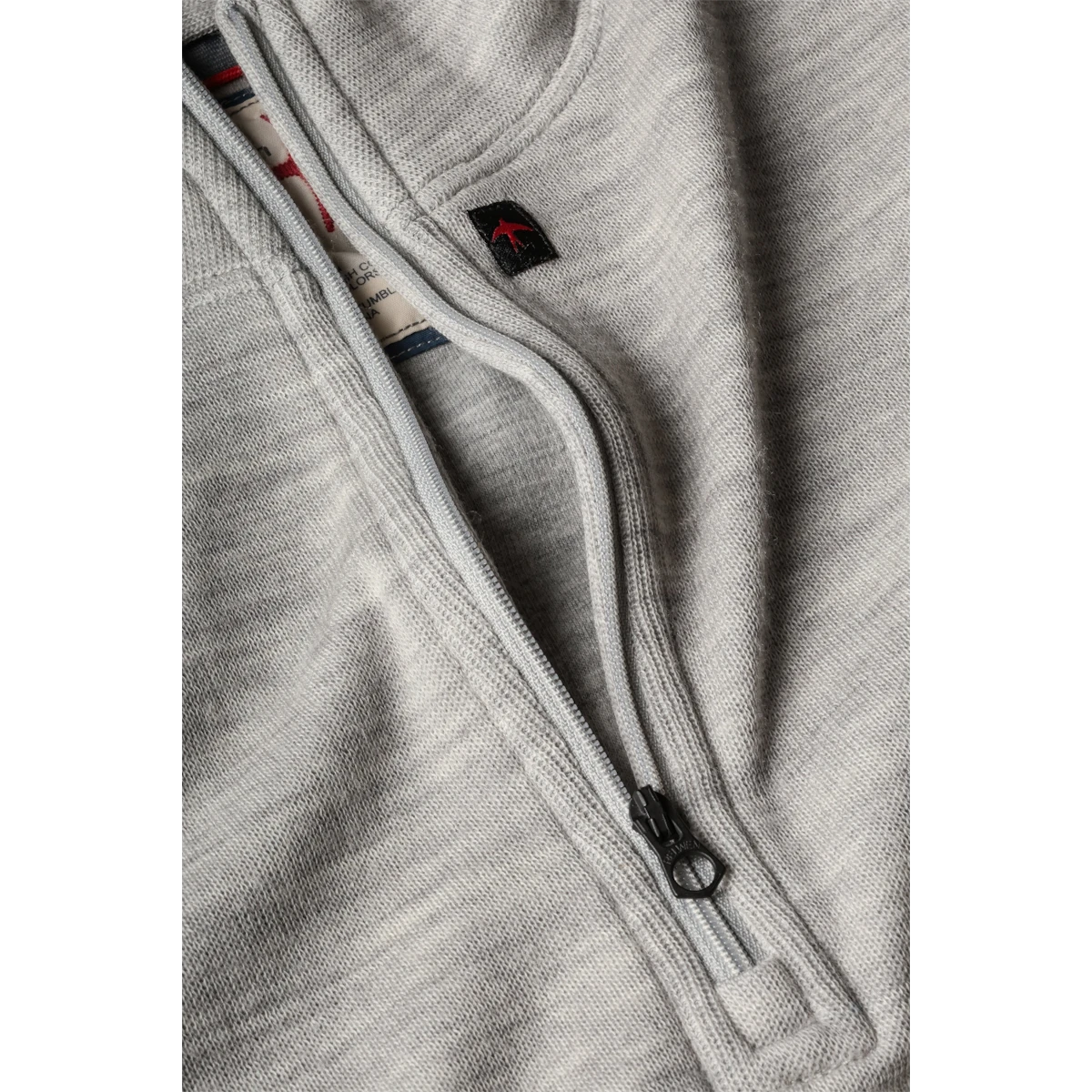 MILWORKS Relwen light grey wool cotton quarter zip sweater featuring a textured knit and branded zipper pull