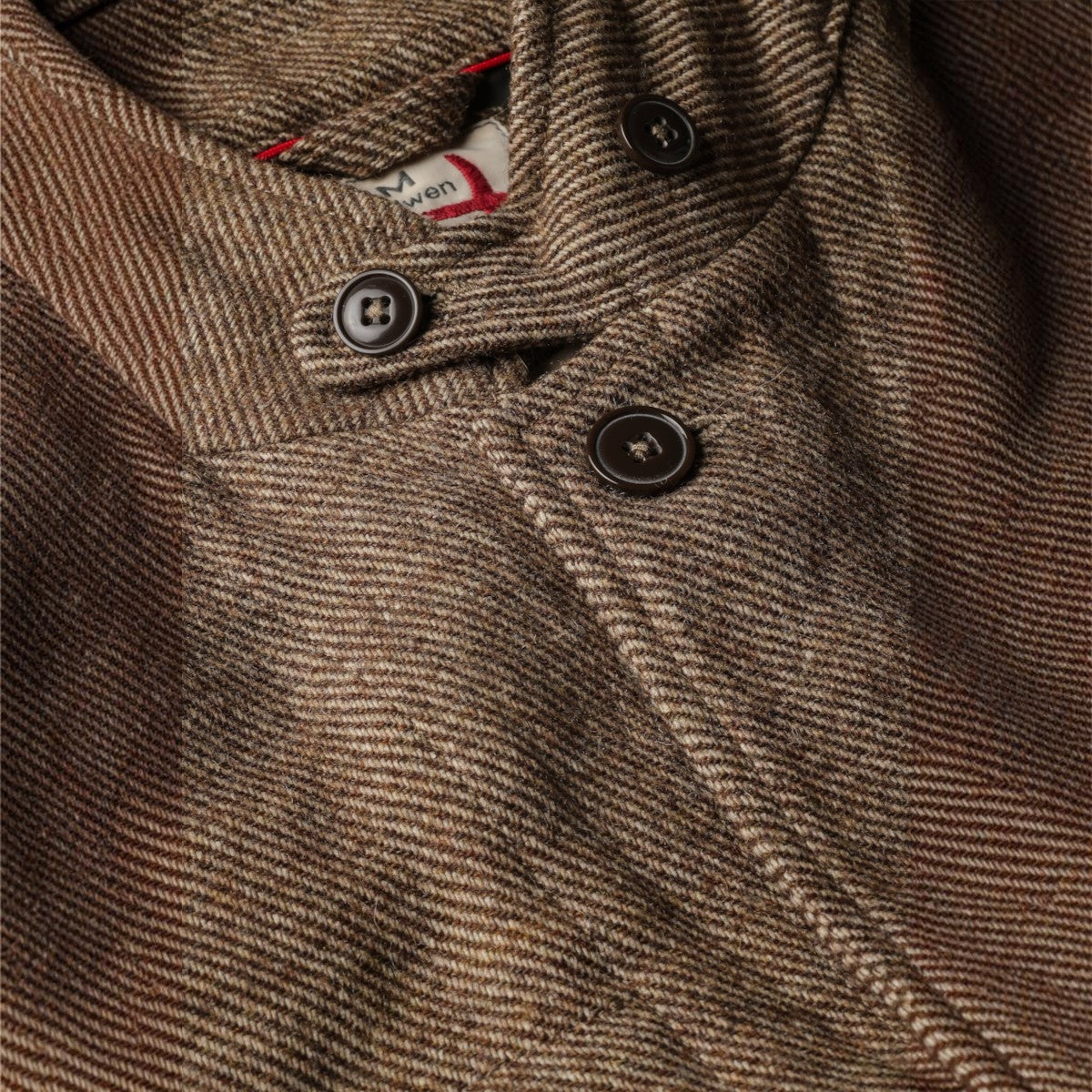 Close-up of MILWORKS Relwen Heritage Trap Blazer in rustic brown twill fabric with button-up collar detail