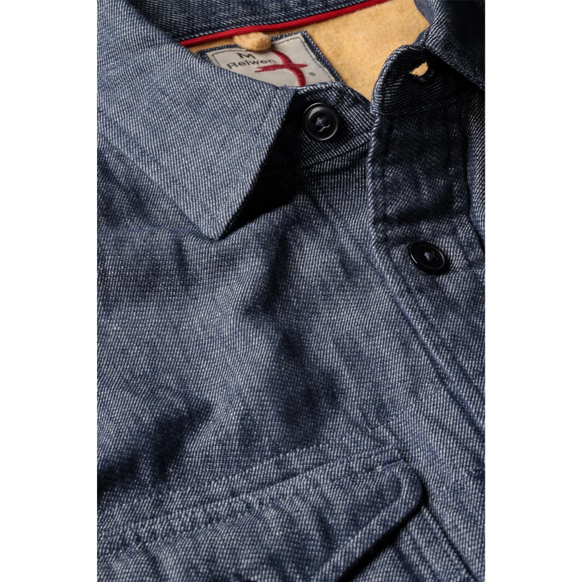 MILWORKS Relwen Utility Workshirt in indigo yarn-dyed twill with a contrasting tan interior collar lining