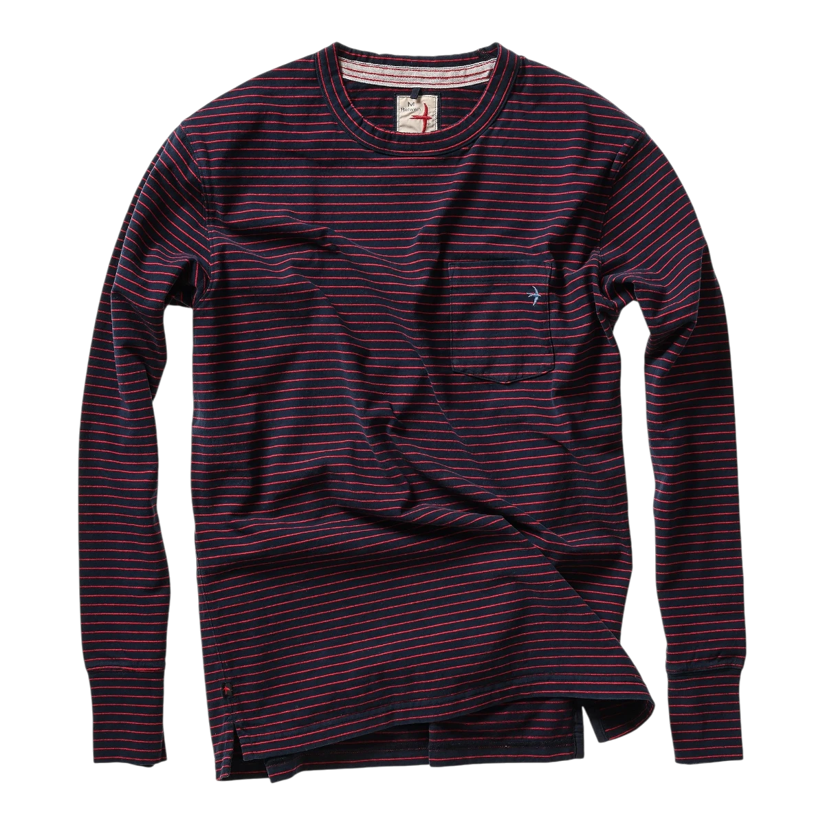 MILWORKS Relwen ringspun long sleeve pocket tee in navy blue with thin red horizontal stripes and a chest pocket.