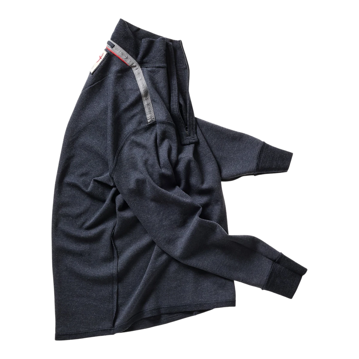 MILWORKS Relwen dark navy quarter zip sweater made from a wool cotton blend with ribbed cuffs and collar detail.