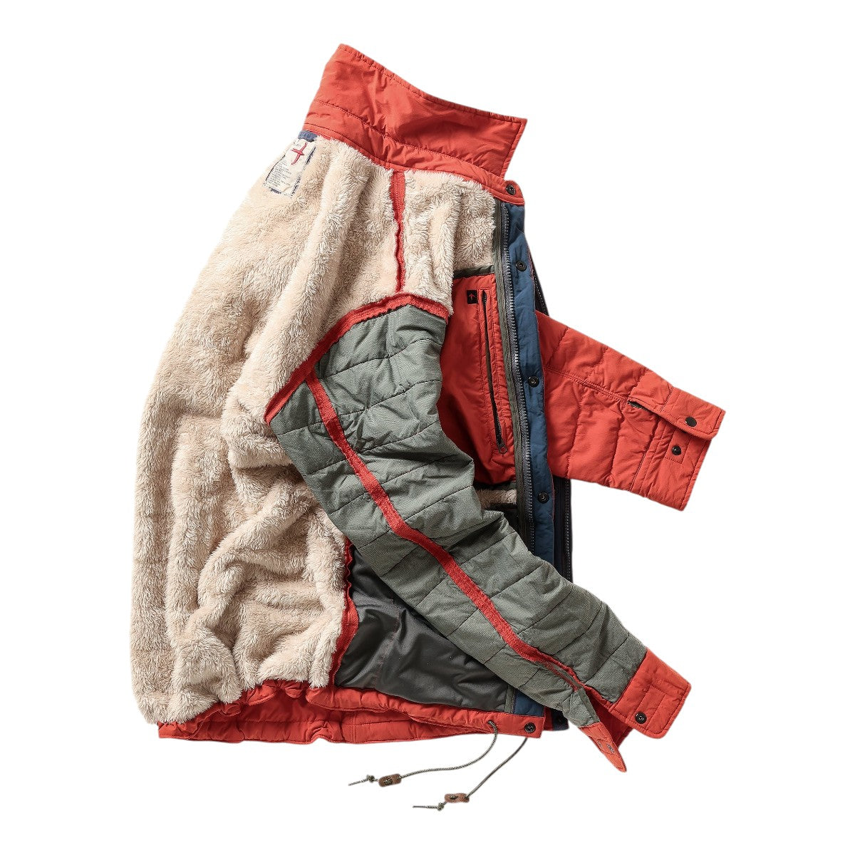 MILWORKS Relwen quilted superfleece jacket in dark orange with a plush beige fleece lining and grey quilted panels.