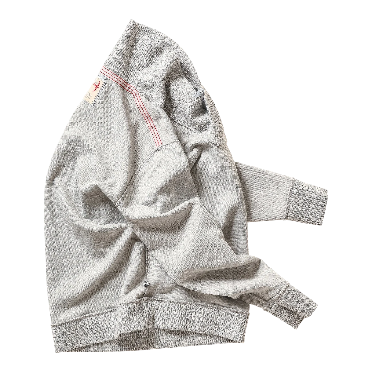 MILWORKS Relwen Ridge Twist shawl collar pullover in pale grey with red stitch detail on the shoulder