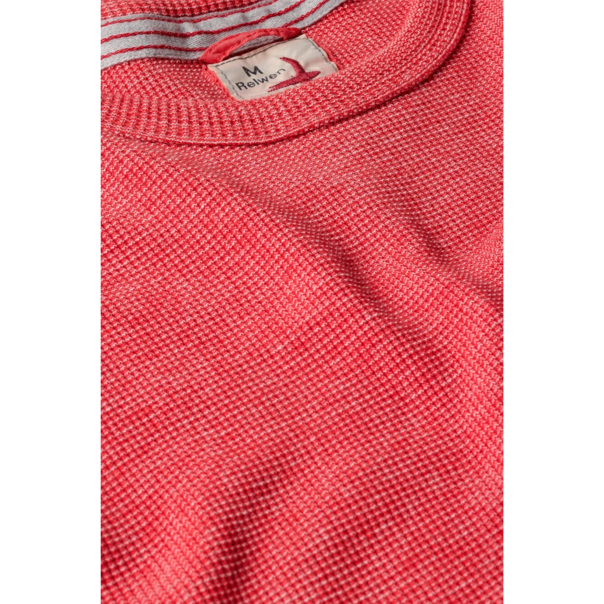 MILWORKS Relwen Bi Waffle Crew sweater in sunset red with a textured waffle knit pattern and ribbed collar detail.