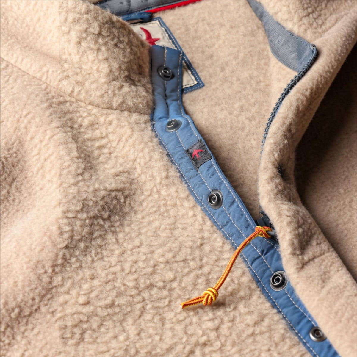 MILWORKS Relwen Wooly Shag Snap fleece in dark biscuit featuring a blue placket with snap buttons and zipper