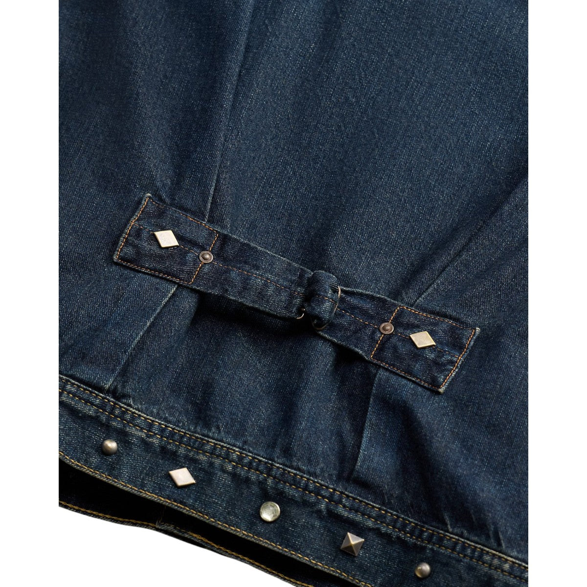 MILWORKS Ridgewood denim trucker jacket back view featuring adjustable buckled strap and decorative metal studs