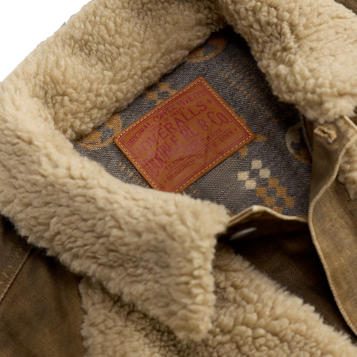MILWORKS RRL vintage brown denim jacket with a plush cream shearling collar and branded leather interior patch