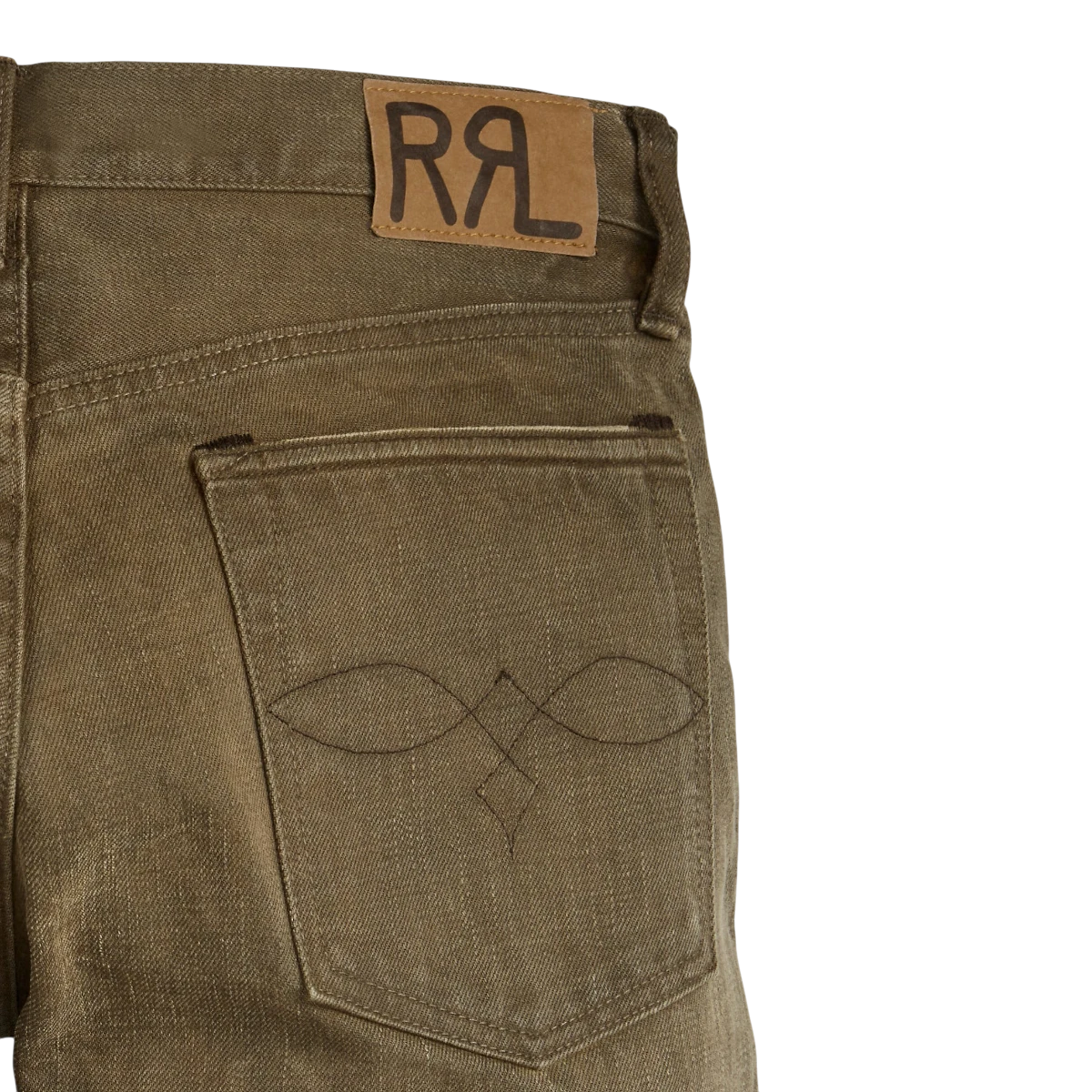MILWORKS RRL slim fit distressed brown jeans featuring a debossed logo patch and decorative back pocket stitching.