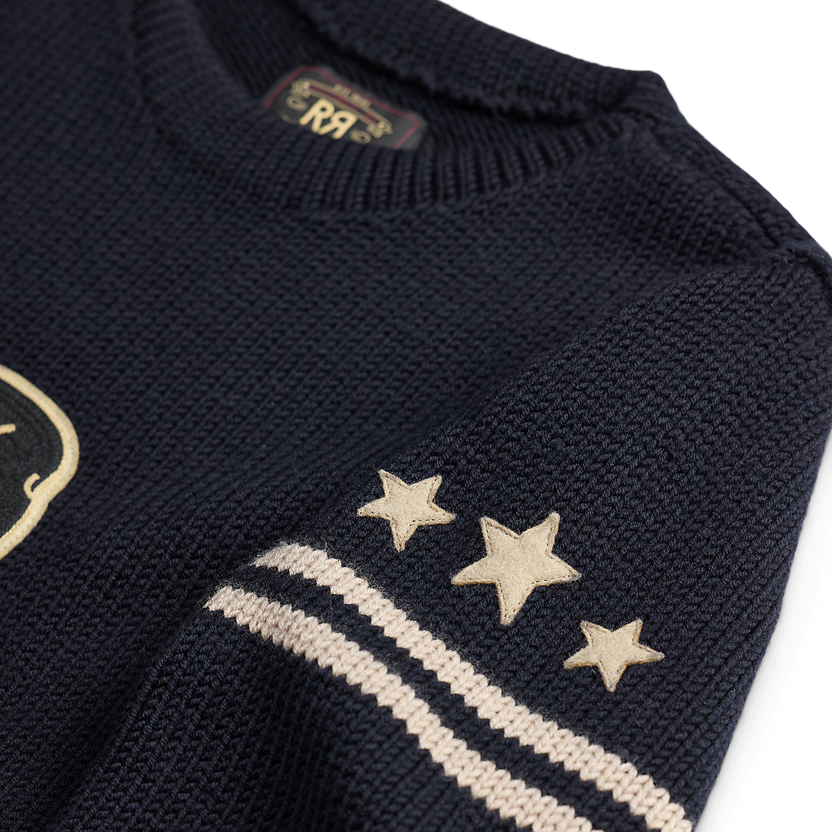 MILWORKS RRL dark navy long sleeve pullover sweater featuring cream star embroidery and striped sleeve detail