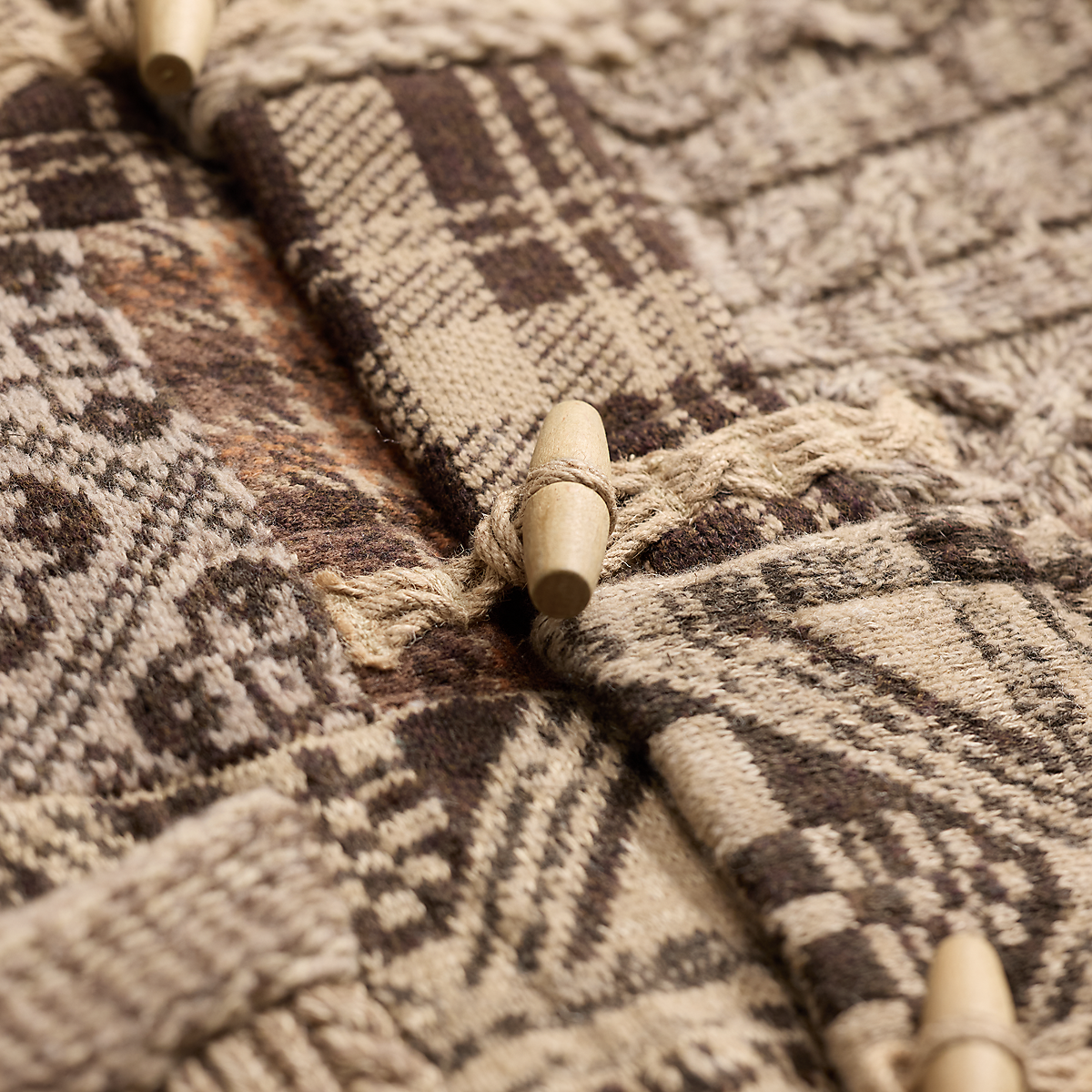MILWORKS RRL wool blend full zip sweater featuring a brown and cream patterned knit with wooden toggle closures