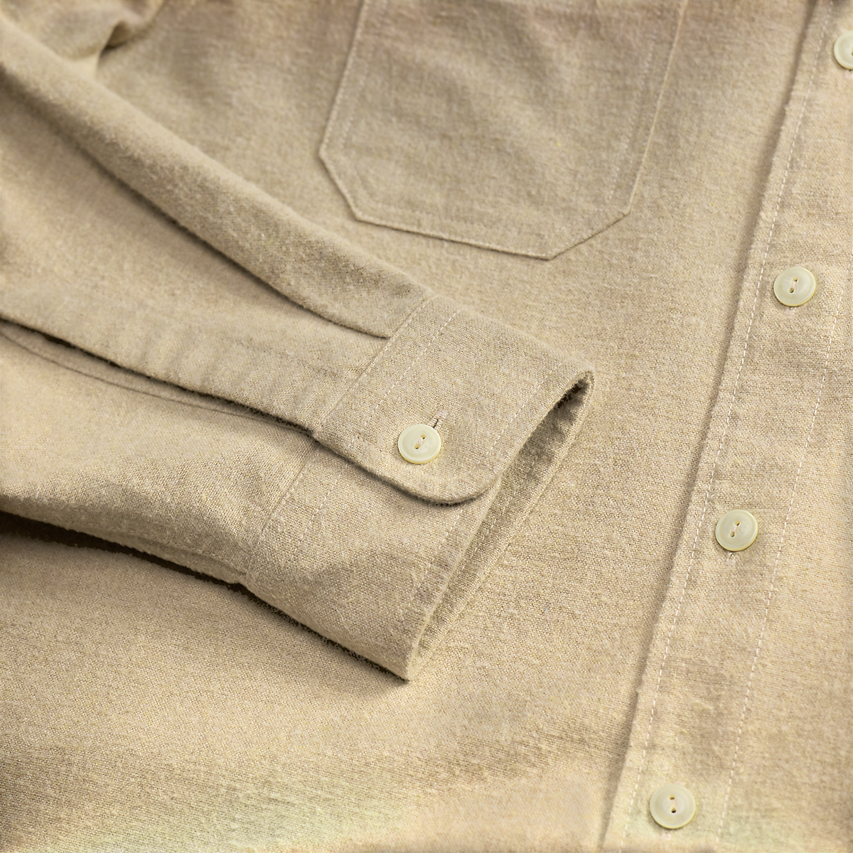 MILWORKS RRL woven sport shirt in a textured grey and cream fabric with a buttoned cuff and chest pocket.
