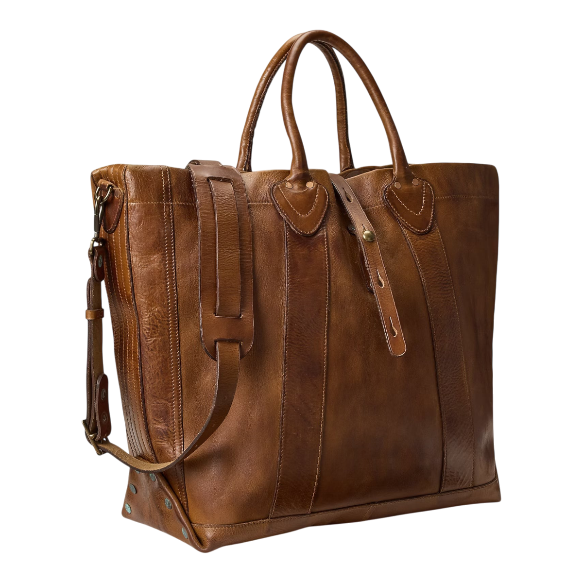 MILWORKS saddle brown full-grain leather tote bag with vintage brass hardware, top handles, and shoulder strap.