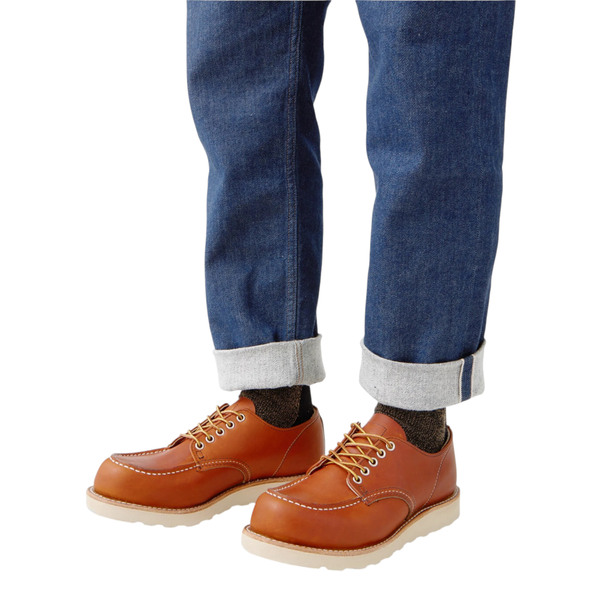 MILWORKS Shop Moc Oxford in Oro Legacy leather with white Traction Tred wedge sole, worn with blue cuffed denim jeans.