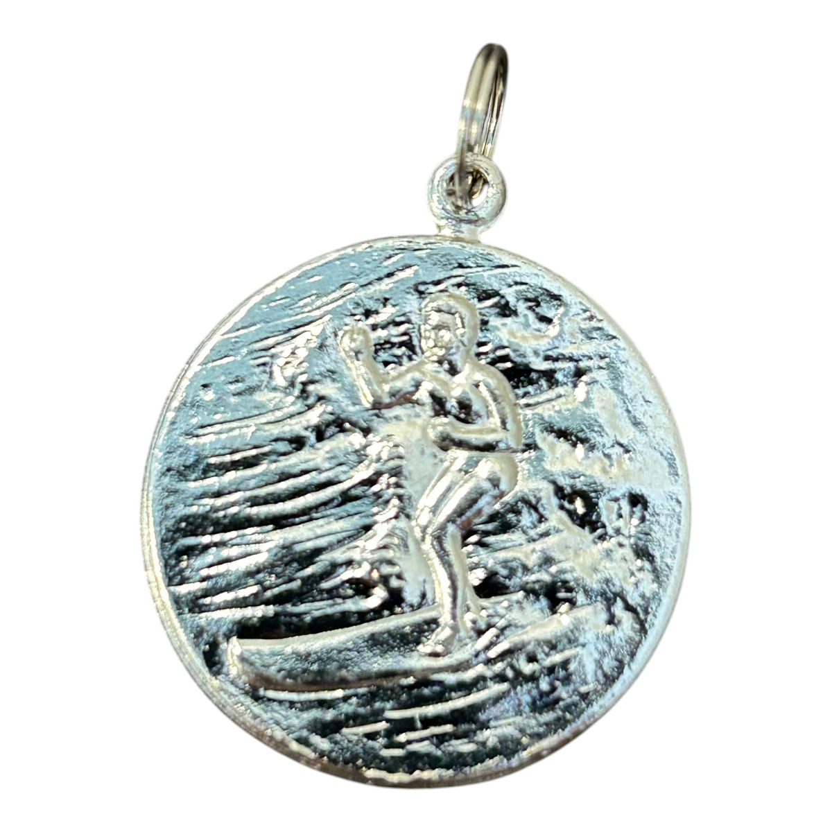 MILWORKS plated steel St Christopher pendant featuring a detailed surfer design on the back in a 25mm round charm.