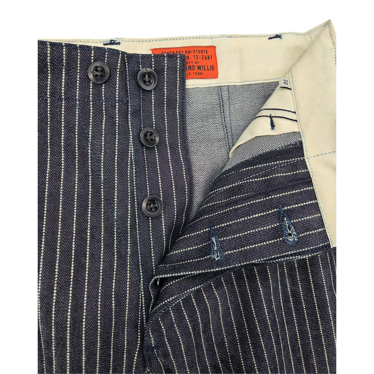 MILWORKS carpenter pants in rigid indigo striped denim featuring a high rise, button fly, and cream interior lining.
