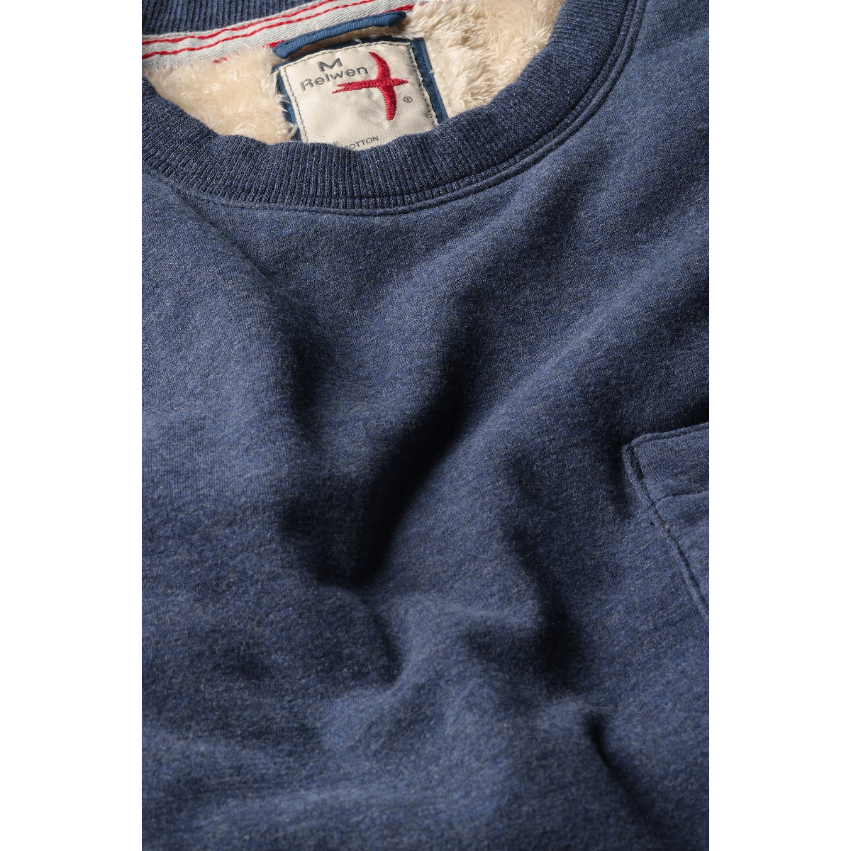 Milworks navy fade heather superfleece crew sweatshirt with sherpa lining and chest pocket detail.