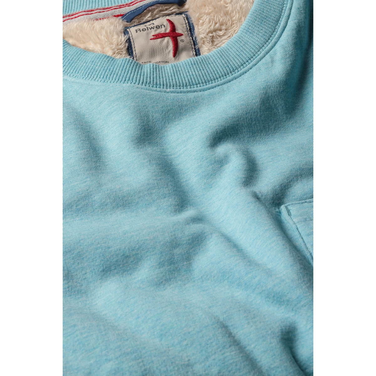 Milworks Superfleece crew neck sweatshirt in ocean heather blue with sherpa lining and chest pocket detail.