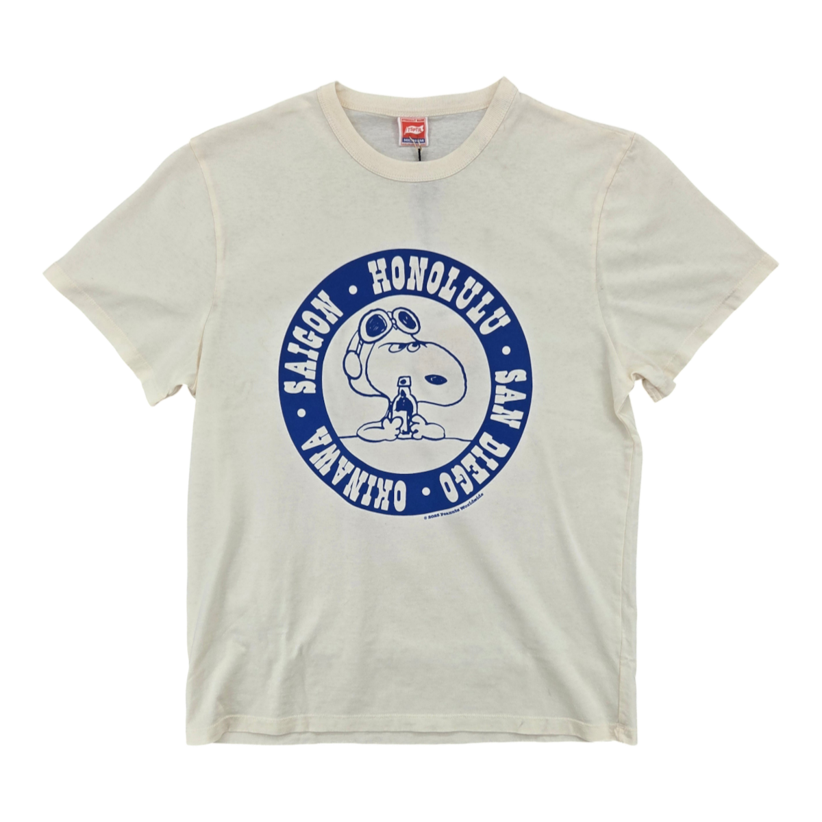 MILWORKS TSPTR vintage white cotton t-shirt featuring a blue circular graphic of Snoopy with travel destinations
