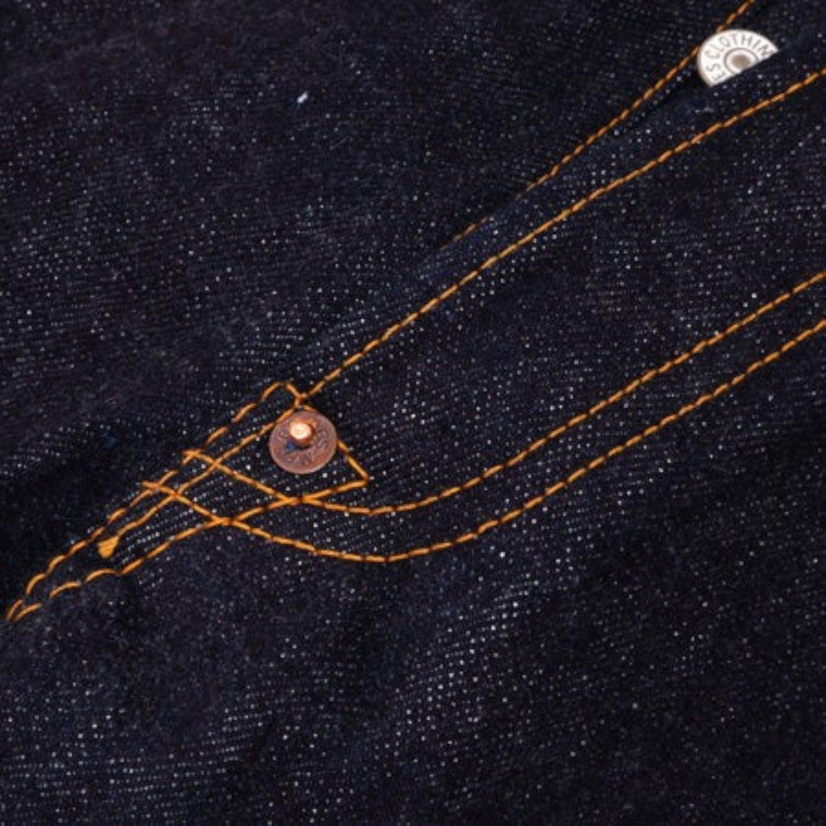 MILWORKS UES 17oz raw selvedge denim jeans featuring heavy dark indigo fabric with contrast copper stitching and rivets
